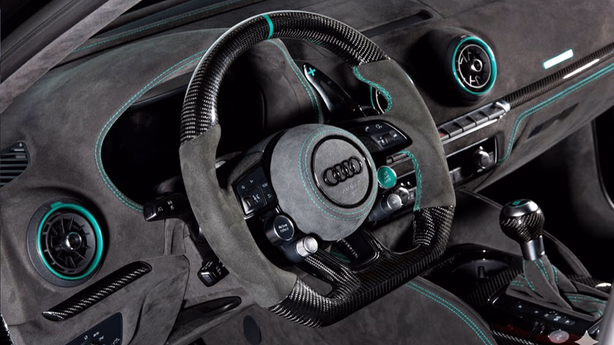 Leistungsstarkes Audi-Carbonschaltknauf mit Rennsport-Design, perfektes Detail für Autoliebhaber.